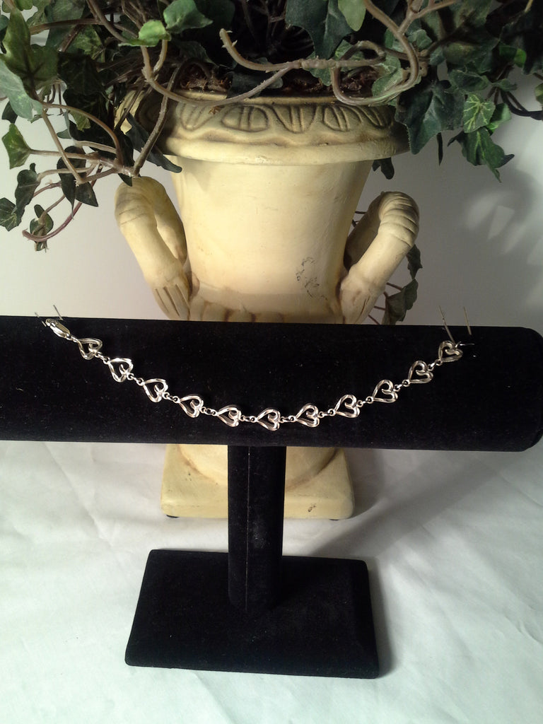 Sterling Silver 7in Hollow Heart Diamond Cut Bracelet