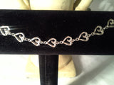 Sterling Silver 7in Hollow Heart Diamond Cut Bracelet